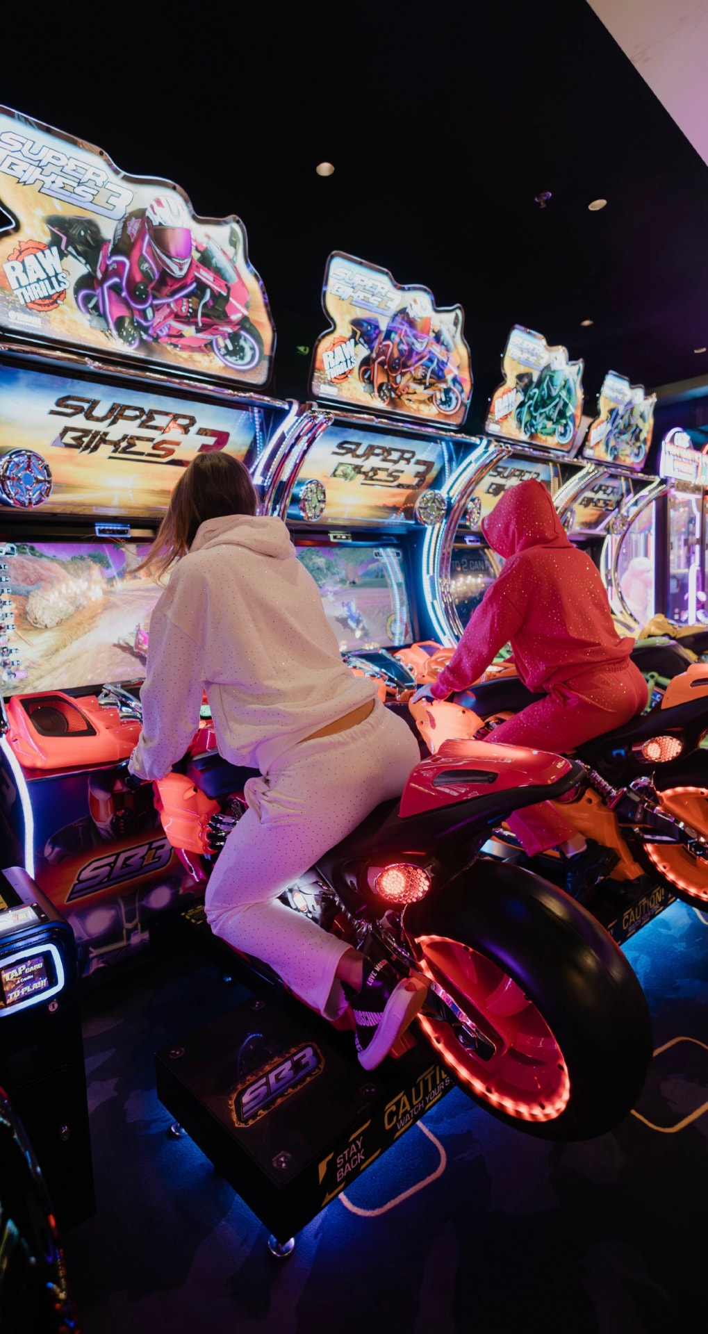 Models on arcade racing machines